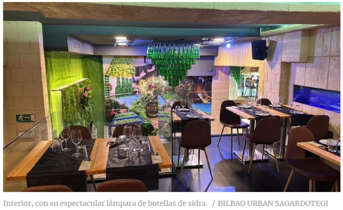 La tradición del txotx en una moderna sidrería urbana de Bilbao