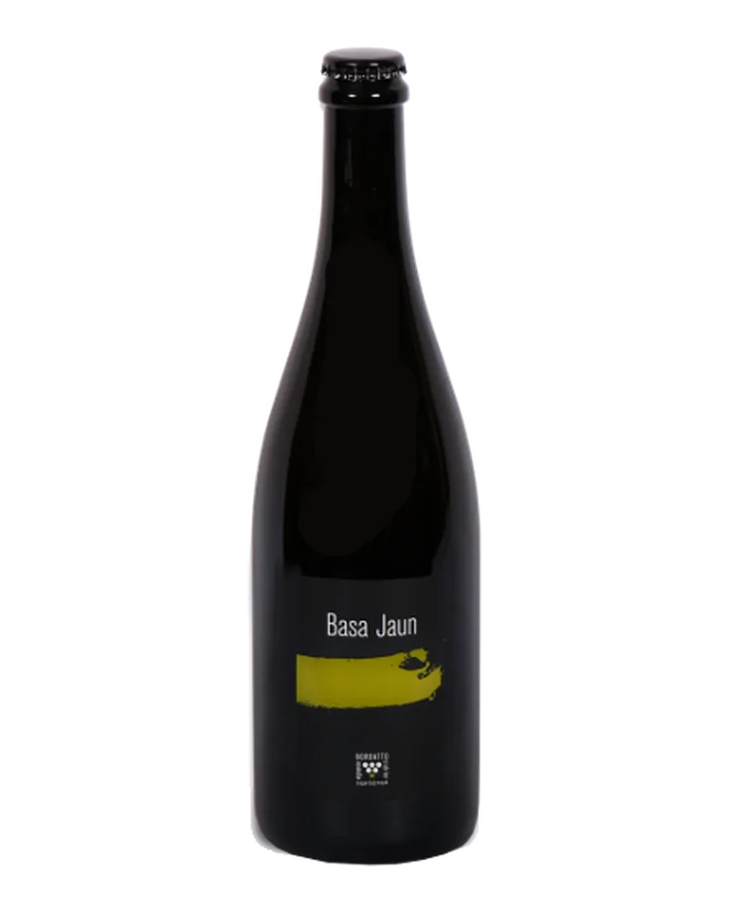Dark bottle of Bordatto’s Basajaun cider, with a crown cap and a black label with a yellow band