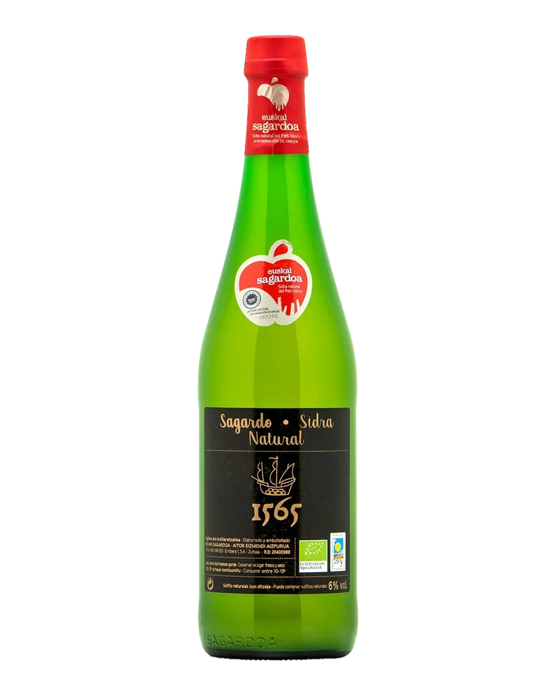 Bottle of Ekain 1565 natural cider, with a red capsule, the designation of origin seal and a black label