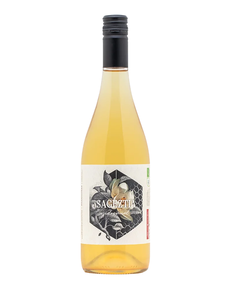 Clear bottle of Sageztia, Iparragirre’s cider-mead, with a white engraved label showing a flower and honeycomb