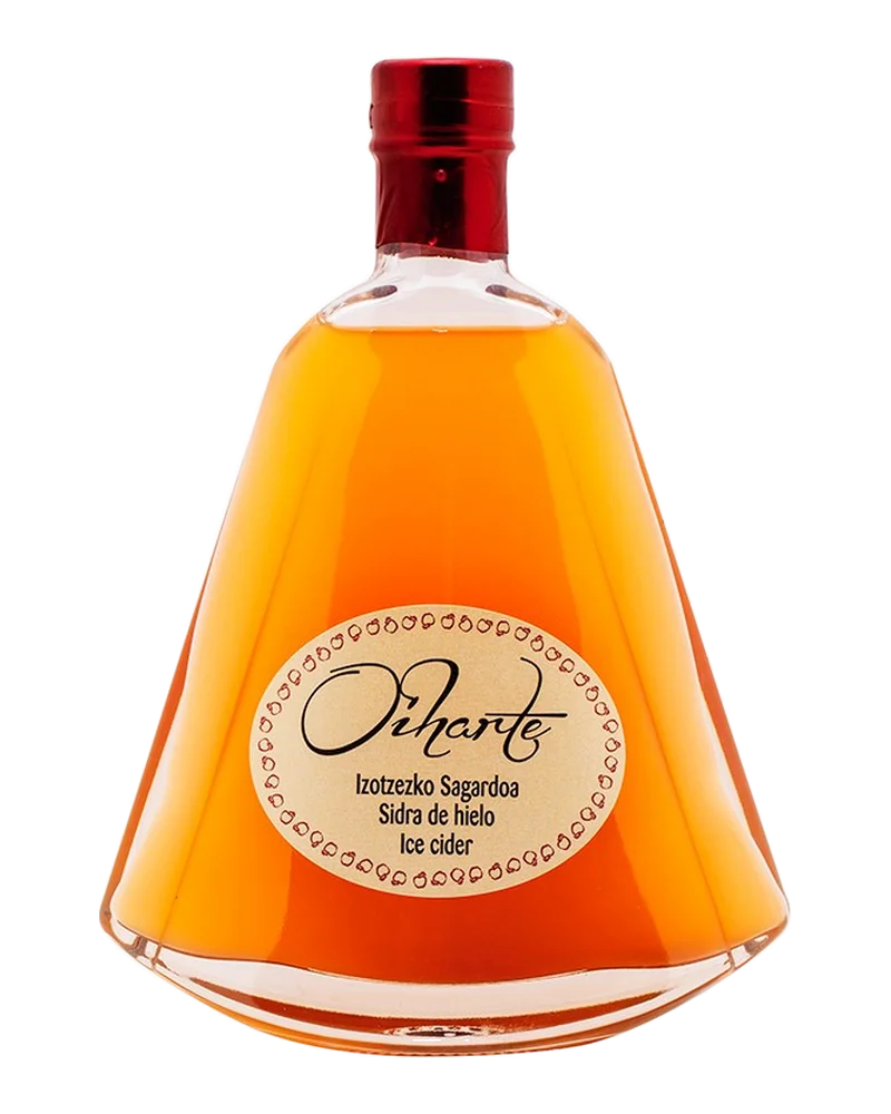 Botella acampanada de sidra de hielo de Oiharte, de color ámbar, con etiqueta ovalada y cápsula roja