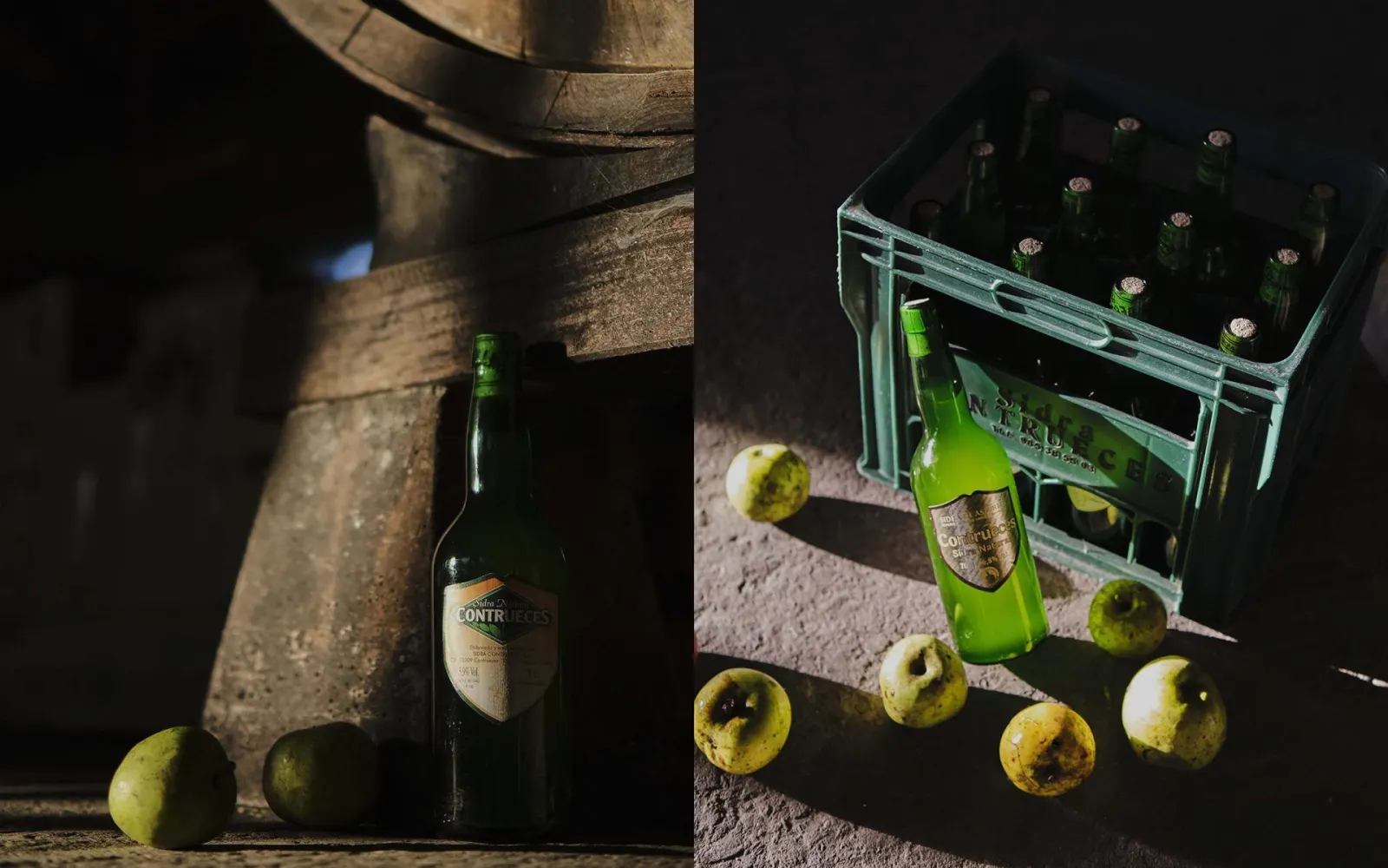 Botellas de sidra Contrueces junto a un tonel y a una caja de botellas, con manzanas en el suelo